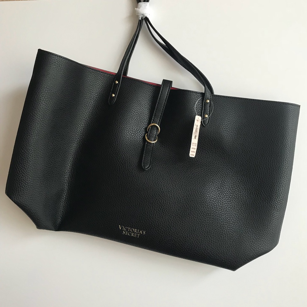 Victoria’s Secret tote with small makeup pouch.
